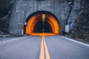 A road tunnel with lights and as the featured image of the 'height and load limits' blog.